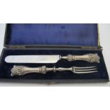 A silver christening set comprising of k