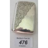 A silver cigarette case with gilded inte