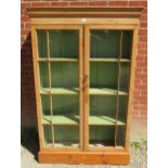 An antique pine glaze bookcase, the 16 p