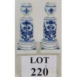 A pair of Meissen blue and white candles