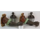 A pair of late 18th/early 19th Century carved wood Blackamoor arm wall sconces with later lanterns.