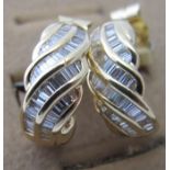 A pair of yellow metal diamond hoop earr