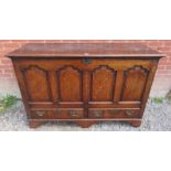 A large 19th century oak mule chest with