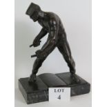 A large period bronze figure of an industrial welder in typical 1930's socialist style signed Osk.