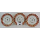 Three late 18th/early 19th Century Armorial porcelain plates with hand decorated orange and gilt