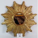 A vintage style gilt wood sunburst mirror with distressed gilt finish. Overall size: 65cm 65cm.