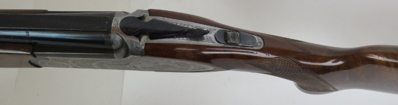 A Rizzini 12 bore over-and-under multichoke, ejector, with game scene to action, 27. - Image 4 of 5