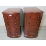 A pair of Edwardian bow fronted mahogany bedside cabinets,