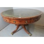 A Regency mahogany drum table with inset tooled green leather surface,