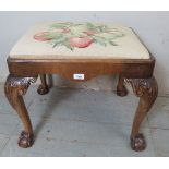 A late Victorian mahogany music stool in the Chippendale Revival taste,