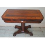 A 19th century rosewood turnover card table,