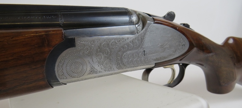 A Rizzini 12 bore over-and-under multichoke, ejector, with game scene to action, 27. - Image 2 of 5