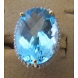 Large blue topaz & white sapphire 14k wh