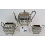 A late Victorian three piece silver plat