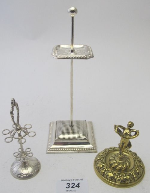 A collection of three hatpin stands, a s