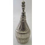A white metal Eastern vase shaped flask