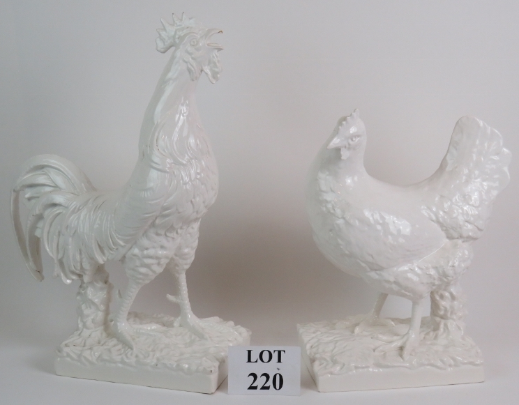 A pair of white Portuguese Majolica pott