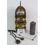 An 18th Century style brass lantern cloc