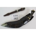 An Indian Kukri knife in decorated leath