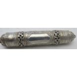 A white metal Tibetan prayer roll holder