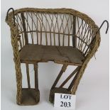 An Edwardian wicker canework child's vin