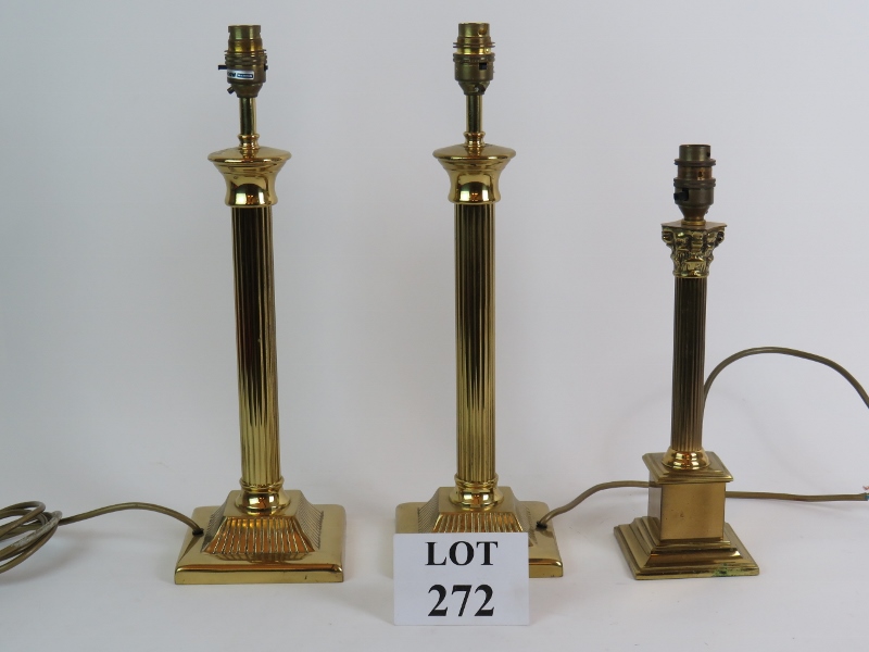 A pair of modern brass column table lamp