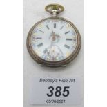An ornate pocket watch with enamelled di
