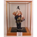 A scale model of a Japanese Geisha in ri