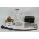 An ornate Victorian brass inkwell, an antique Eastern sword, a silver plate fitted glass water jug,