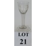 A Georgian plain stem wine glass with folded foot and engraved bowl with lark and flowers circa