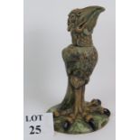 A Cobridge Pottery grotesque bird decanter in the style of The Martin Brothers. Overall height: 35.