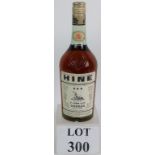 A bottle of Hine Cognac Three Star circa 1960's, 24 fluid oz. Condition report: Level low neck.