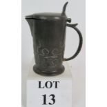 An Arts and Crafts Tudric Pewter jug design No 0967 by Archibald Knox for Liberty & Co.