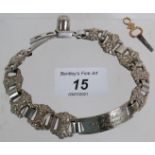 An early 20th Century silver plated adjustable linked dog collar with cast rococo links and