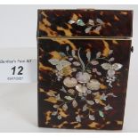 A Victorian inlaid tortoiseshell card case with intricate mother of pearl inlay in the form of a