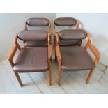 A set of four Danish mid century teak framed dining chairs,