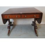 A Regency figured mahogany & rosewood veneer sofa table,