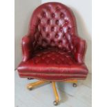 A good quality vintage style Chesterfield swivel and reclining Director's desk chair,