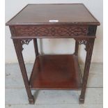 A Chinese-Chippendale Revival small square mahogany occasional table with carved frieze decoration