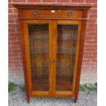 A good quality modern Italian 18th century style glazed fruitwood cabinet, with frieze drawer,