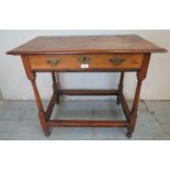 An 18th century fruitwood & oak side table of excellent colour & patina with single frieze drawer