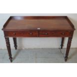 A Victorian mahogany console table with 3/4 gallery & two figured mahogany frieze drawers each