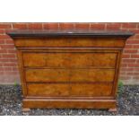 A 19th century continental fossilized black marble topped burr walnut chest of five long drawers,