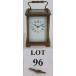 A brass cased 8 day carriage clock with