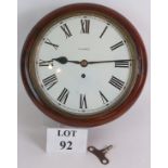 An antique mahogany cased wall clock wit