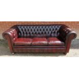 A vintage Chesterfield three seater leat
