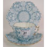 A late 19th Century blue Wileman and Co Foley China snowdrop pattern trio of cup saucer and plate