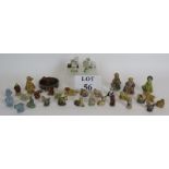A collection of Wade pottery Whimsies and figures, some early. (34).