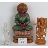 A large carved wood sitting Buddha decorated in polychrome colours,