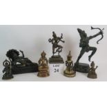 Seven cast metal figures of mainly Hindu deities including Ganesh. Shiva and Hanuman. Tallest: 33cm.